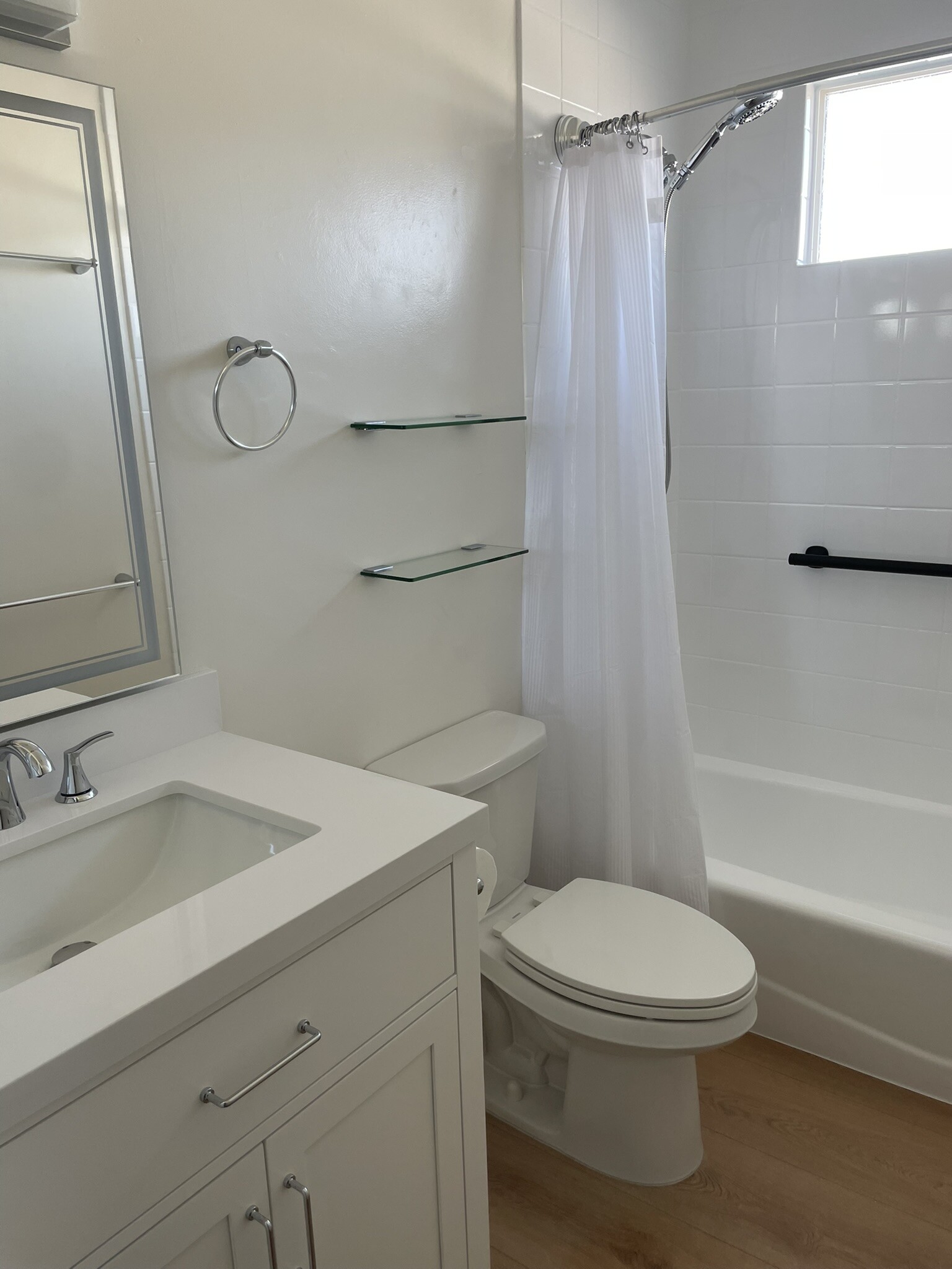 New mirror, light fixture, medicine cabinet, vanity, countertop, faucets, shelving - 1039 6th St