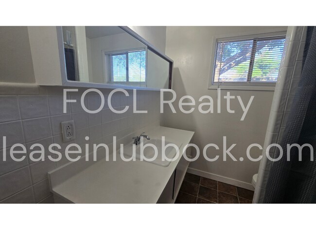 Building Photo - Affordable, updated 3/1/Carport