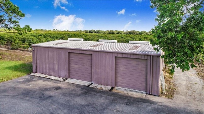 Building Photo - 7740 Lake Hatchineha Rd