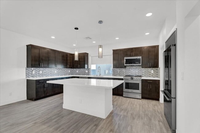 Building Photo - Stunning 4-Bedroom Home in Gated Community Near I-215 & Top Amenities!