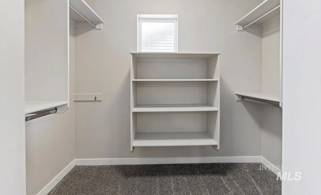 Building Photo - Stunning 4-Bedroom Home with Privacy & Low-Maintenance Living in Verado