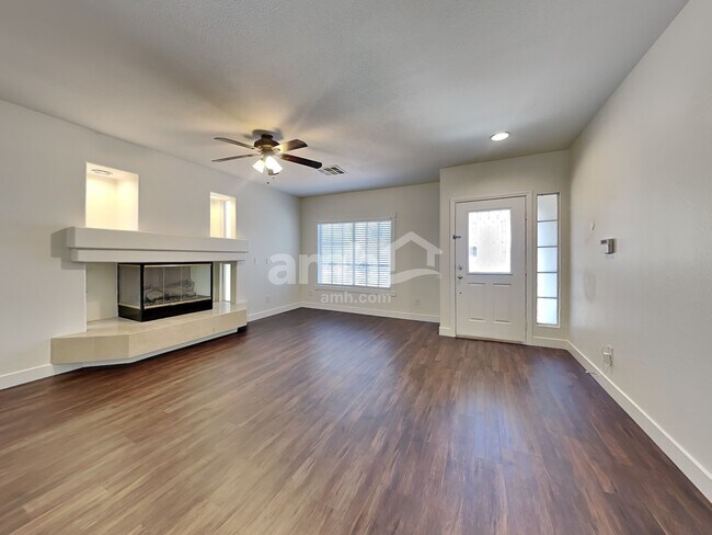Building Photo - 10749 Artesia Wells St
