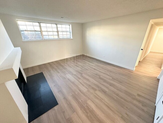 Building Photo - 9110 E Girard Ave