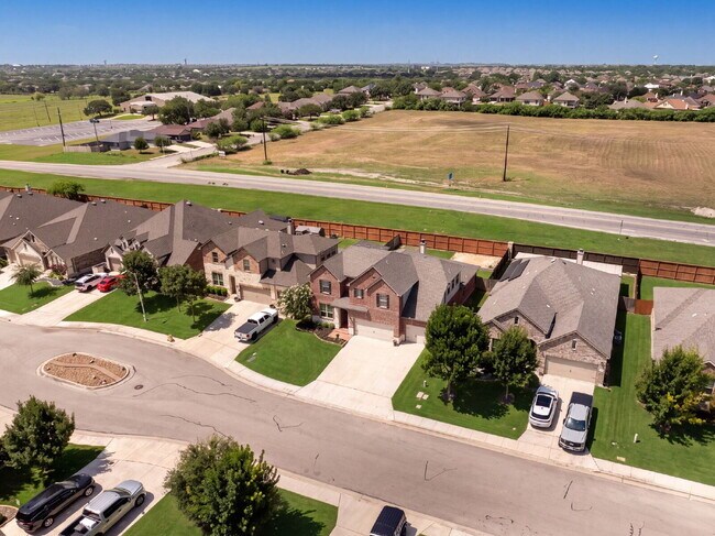 Building Photo - No Rear Neighbors, 3 Car Garage, a Chef's Kitchen, and Room for Everyone