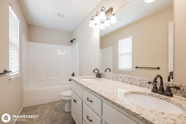 Building Photo - 419 Sunflower Dr, Raymore, MO 64083