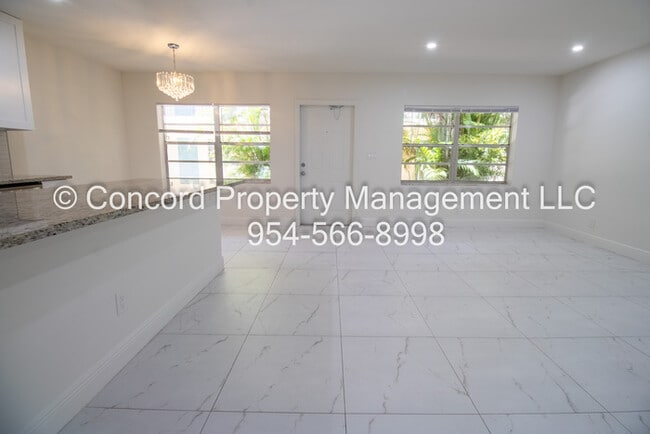 Building Photo - Holiday Special-Updated 2 BR- Open Layout- Island Kitchen-Pool- Central AC