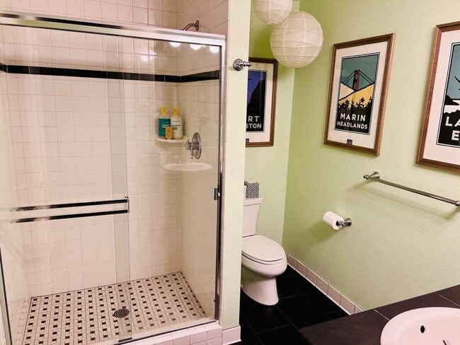 Building Photo - Custom Townhouse with Awesome Back yard