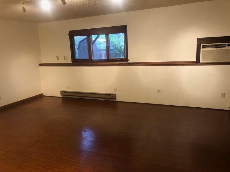 Largte Living Room-View to Fenced Backyard - 309 Olsen St