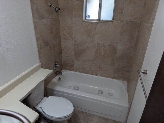 Building Photo - Triplex - 2 Bedroom and 1 Bath Unit