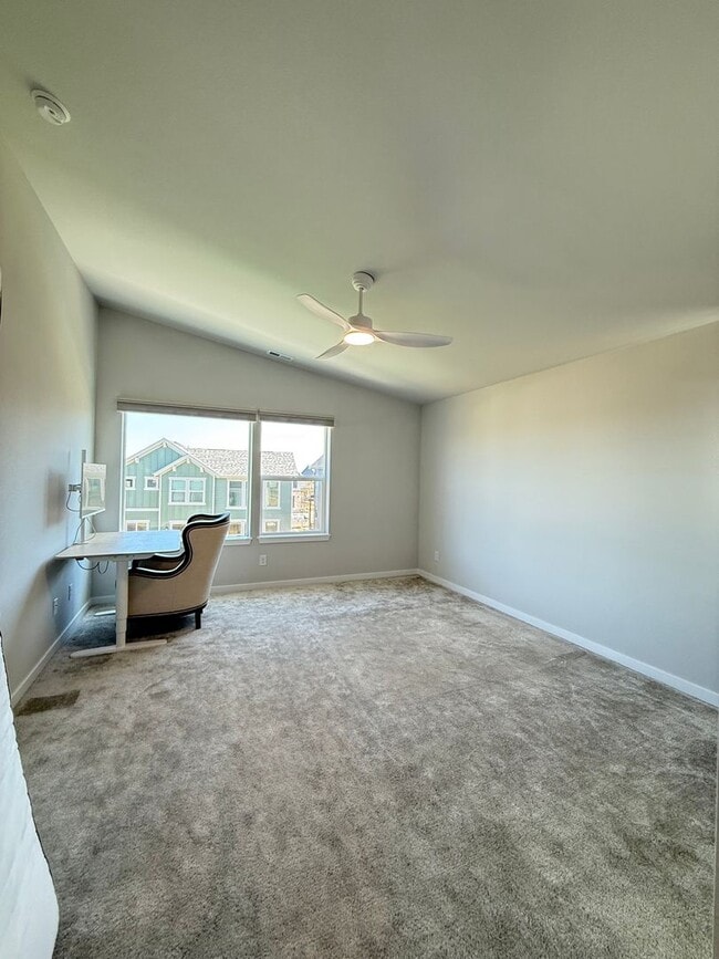 Building Photo - Stunning Luxury Living in Coal Creek with ...