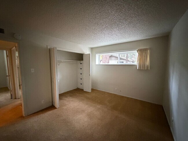 Building Photo - UNFURNISHED Upgraded Condo in Quiet Condominium Complex- New Flooring Coming Soon!