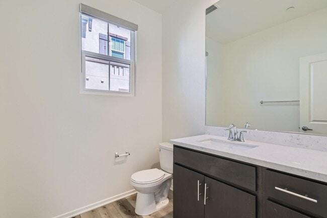 Building Photo - Stylish Three-Story Townhome with Private Courtyard & Pool Access