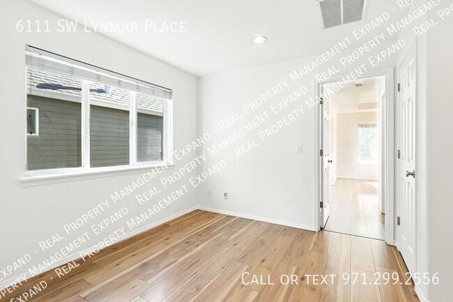 Building Photo - 6111 SW Lynmar Pl