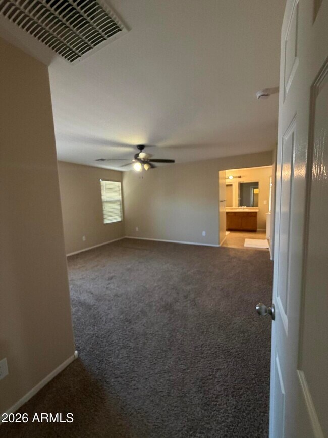 Building Photo - 4723 W Gelding Dr