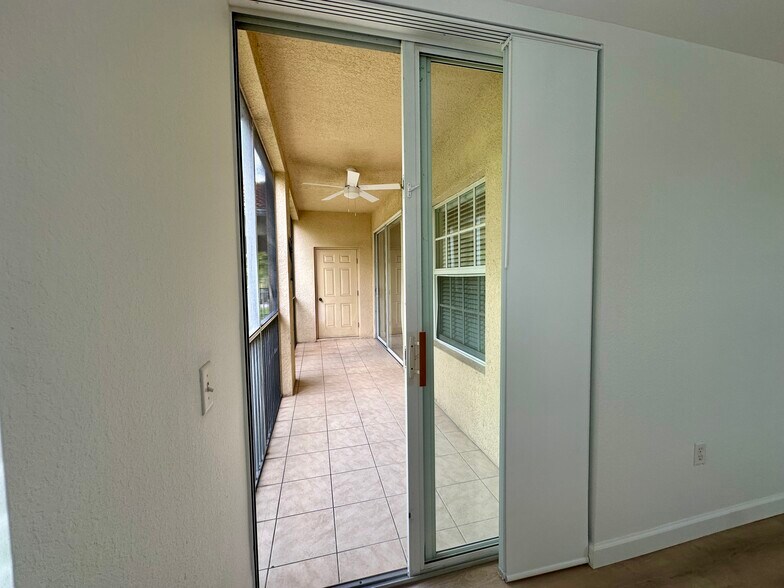 Lanai entrance from primary - 9055 Colby Dr