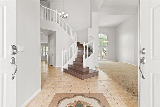 Building Photo - Expansive 4 Bedroom Home with a Pool and L...