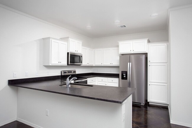 Building Photo - Stunning New 3/2 Townhomes