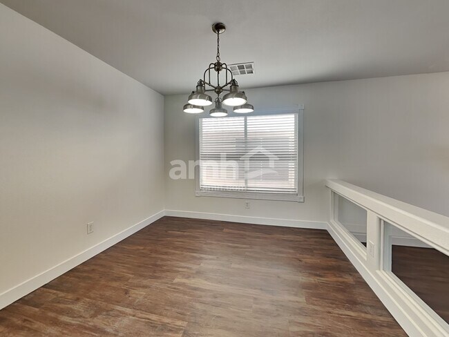 Building Photo - 10749 Artesia Wells St