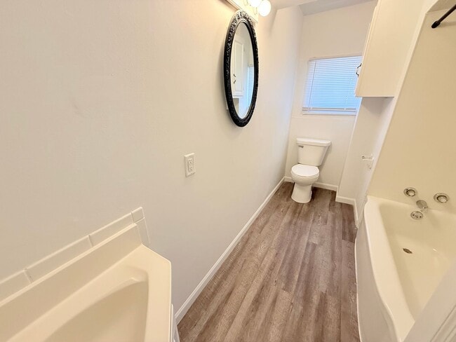 Building Photo - Spacious 4-Bedroom Home with Fenced Backyard