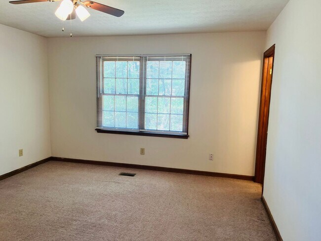 Building Photo - Great location, large wooded and fenced ya...