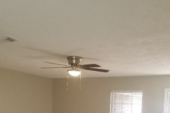 large living room with new ceiling fan - 16778 N Bob White Dr
