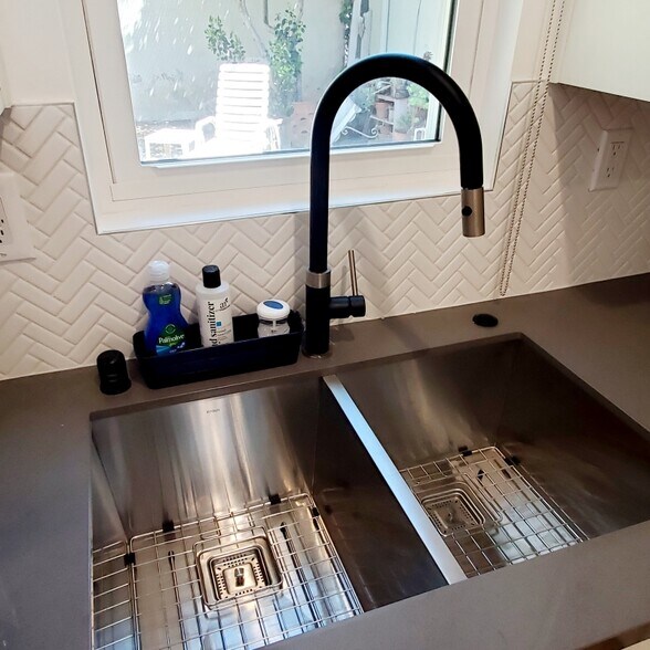 Stainless sink/quartz counter - 8973 W 24th St