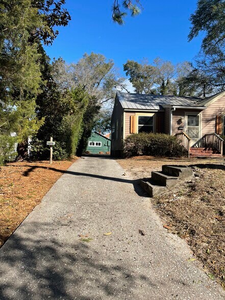 Pull into driveway. There is a front house and this unit is in the far back - 2053 Monroe St