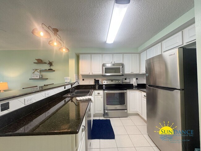 Building Photo - FURNISHED waterfront condo in Desirable In...