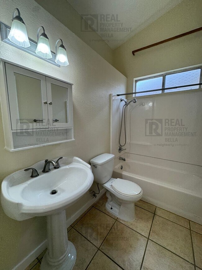 Building Photo - Corner-Lot Charmer with Open Layout and Sp...