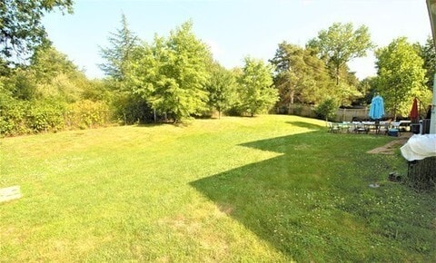 Building Photo - Spacious 4Bd/2.5Bth Single-Family Home with Garage & Fenced Yard – Prime Location!