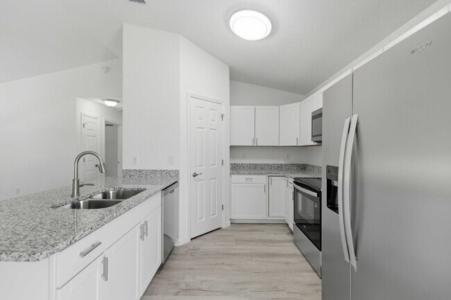 Building Photo - Available Now! New 3/2 Home with Large Backyard and Front Porch