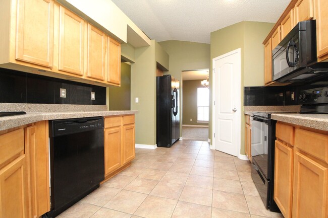Building Photo - Executive 3-Bedroom Brick Home with Florid...