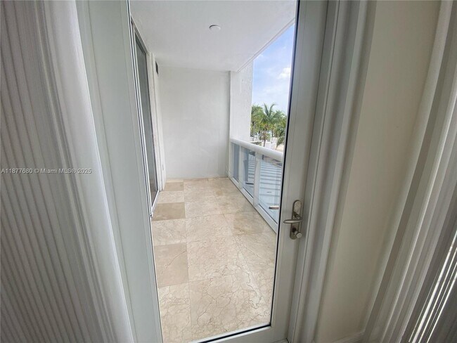 Building Photo - 10275 Collins Ave