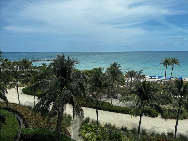 Building Photo - 10275 Collins Ave