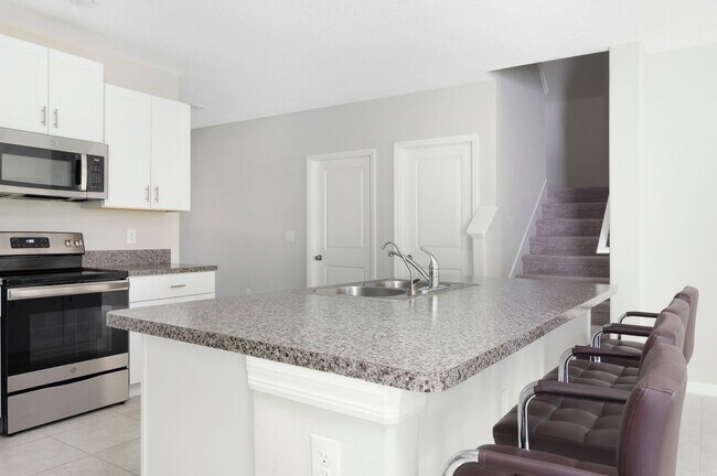 Building Photo - Spacious 5-Bed Touchstone Home – Primary Suite Downstairs, 2-Car Garage