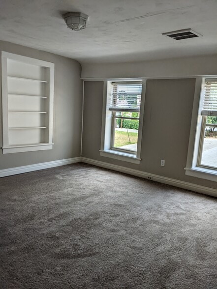 Bedroom with Built-In Shelving - 341 Academy St