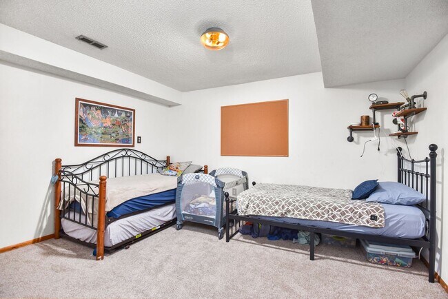 Building Photo - 2700 + sq ft family home has it all! Over 2 acres of land and a stunning view of Lake Pend Oreille