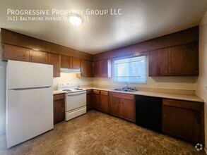 Building Photo - 2-Bedroom, 1-Bathroom Upper-Level Apartmen...