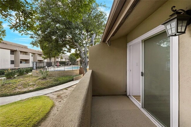 Building Photo - "Charming 1-Bedroom Furnished Retreat with...