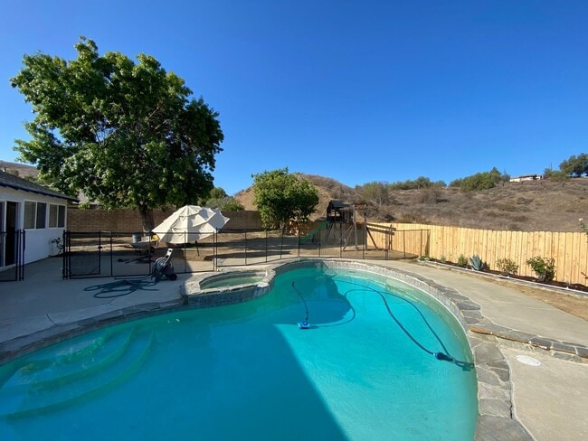 Building Photo - Remodeled 4 bed, 2 bath single story pool home