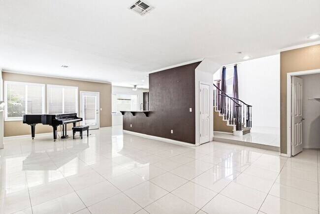 Building Photo - Spacious 4-Bedroom Home with Fireplace, 3-Car Garage & Great Backyard