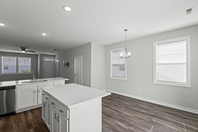 Building Photo - Reduced! 3 Bedroom Townhome each with en-s...