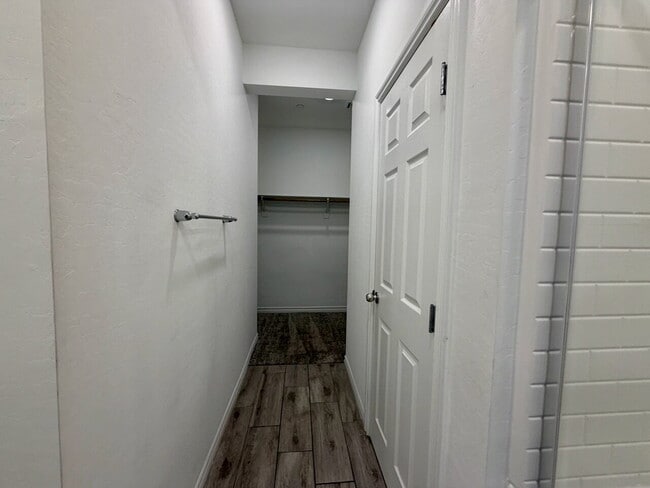 Building Photo - GATED 3 BED 2.5 BATH TOWNHOME WITH 2-CAR GARAGE, COVERED PATIO & COMMUNITY POOL