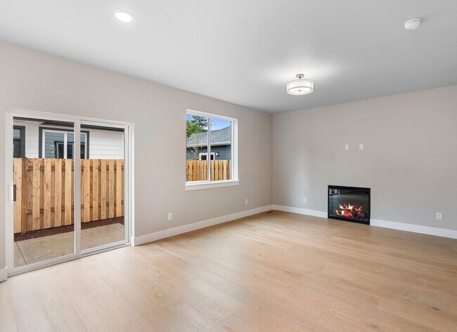 Building Photo - Beautiful New Construction 4-Bedroom Home with a Main-Level Bedroom, Designer Finishes, Attached ...