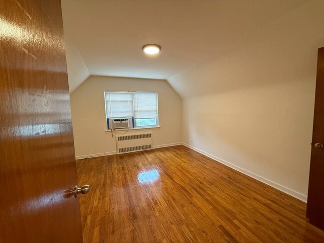 Building Photo - 203-16-203-42 42nd Ave