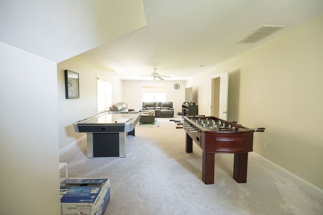 Building Photo - Spacious & Striking 3-story brick Executive 4 bedroom 4.5 bathroom home in Oak Ridge NC + Lawn ca...