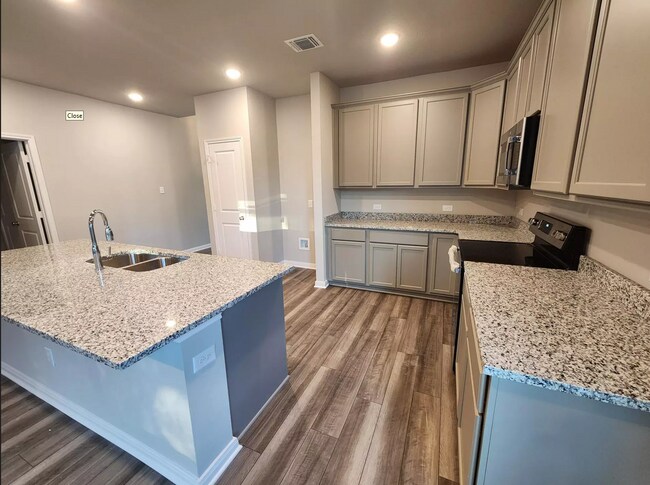 kitchen, comes with refrigerator - 9811 Kensley Rose Dr