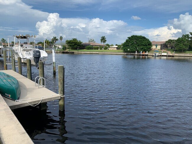 Building Photo - AVAILABLE 2027 SEASON! ! PGI HEATED POOL, WATERFRONT, BOAT LIFT
