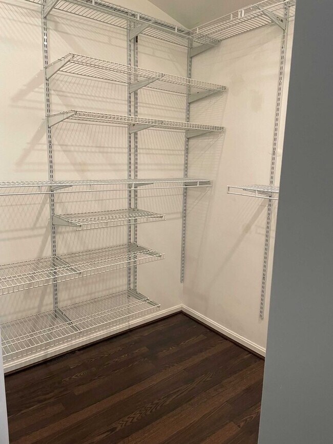 Building Photo - Spacious 3BR Townhome with Walkout Basement, Deck, Fenced Yard, Central A/C + Assigned Parking