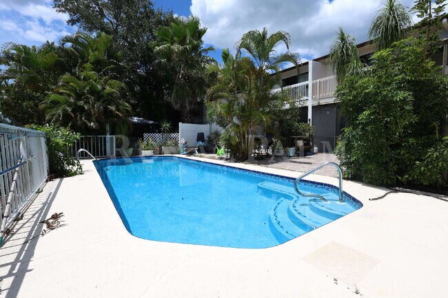 Building Photo - 2 Bed, 2.5 Bath Townhouse with Balcony, Pool & Prime Bonita Springs Location